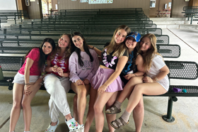 Group of people celebrating on stage