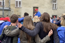 Group of people celebrating on stage