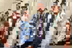 Group of people celebrating on stage