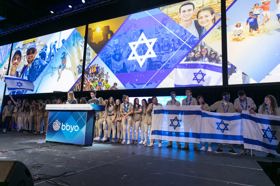 Group of people celebrating on stage