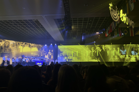 Group of people celebrating on stage