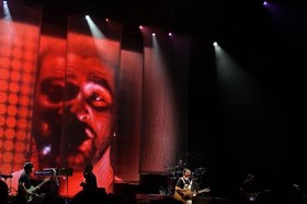Group of people celebrating on stage