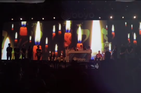 Group of people celebrating on stage