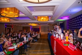 Group of people celebrating on stage