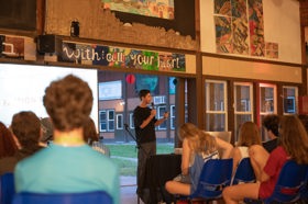 Group of people celebrating on stage