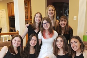 Group of people celebrating on stage