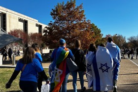 Group of people celebrating on stage