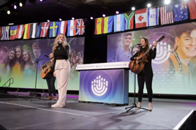 Group of people celebrating on stage