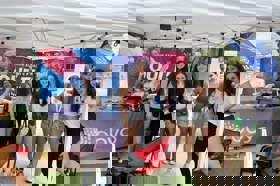 Group of people celebrating on stage