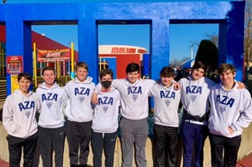 Group of people celebrating on stage