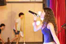 Group of people celebrating on stage