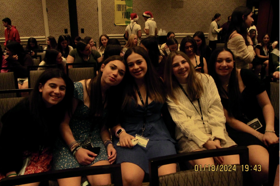 Group of people celebrating on stage