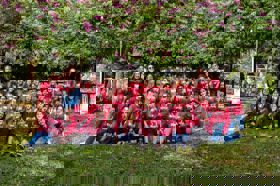 Group of people celebrating on stage