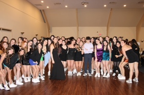 Group of people celebrating on stage