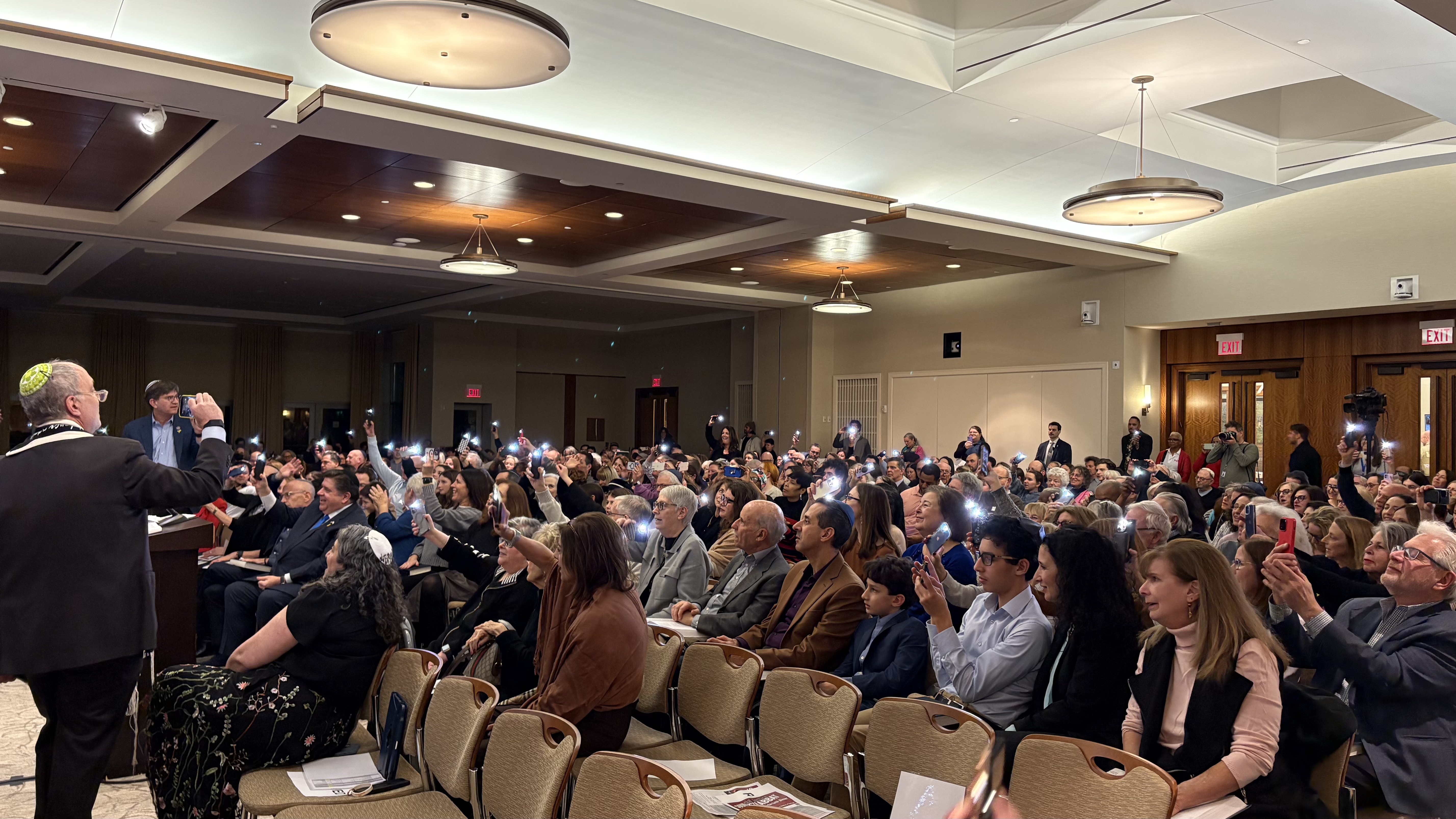 Group of people celebrating on stage
