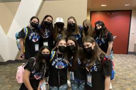 Group of people celebrating on stage