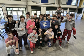 Group of people celebrating on stage