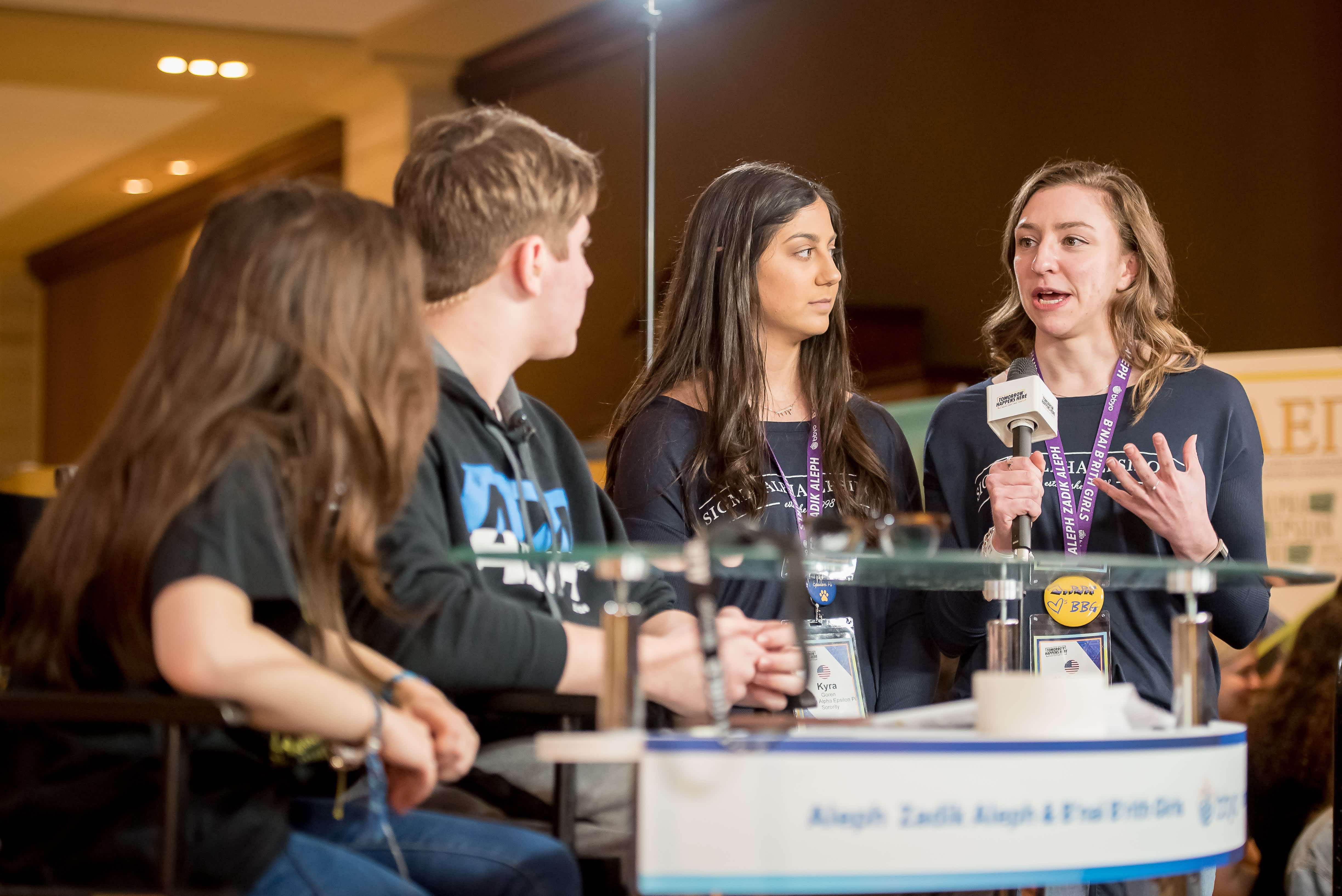 Group of people celebrating on stage