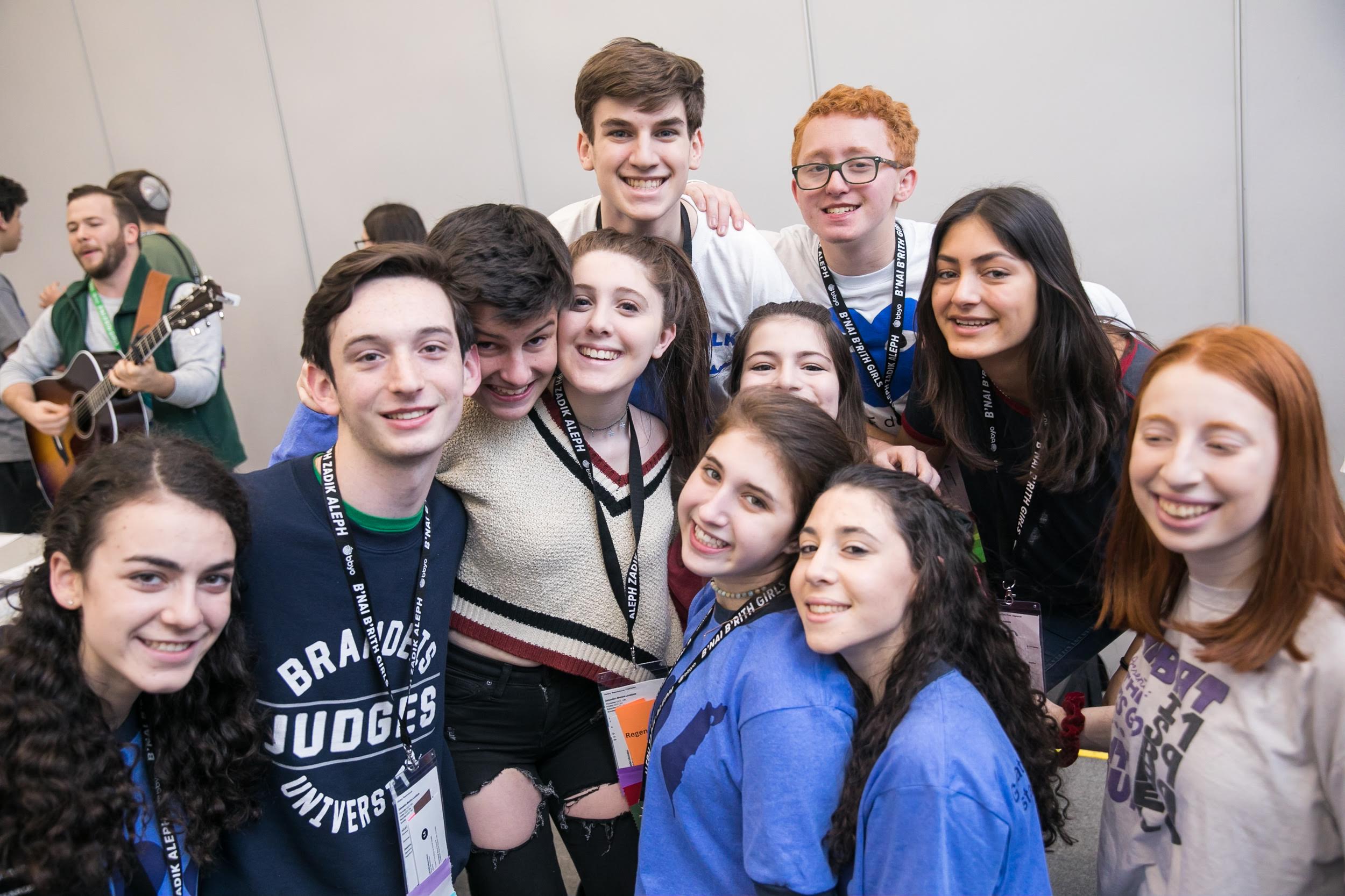 Group of people celebrating on stage