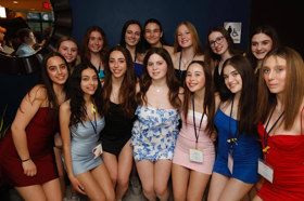 Group of people celebrating on stage