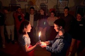 Group of people celebrating on stage