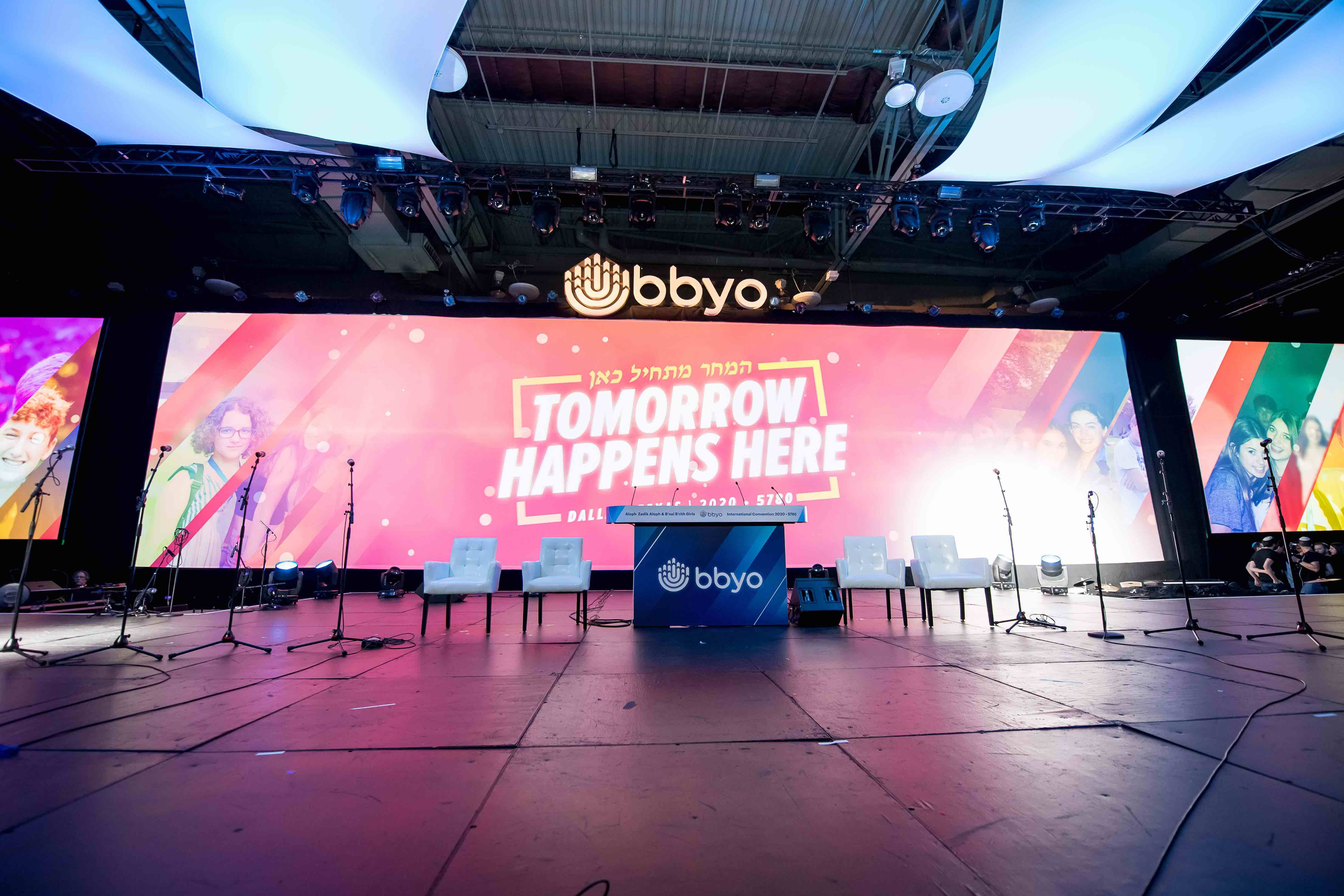 Group of people celebrating on stage