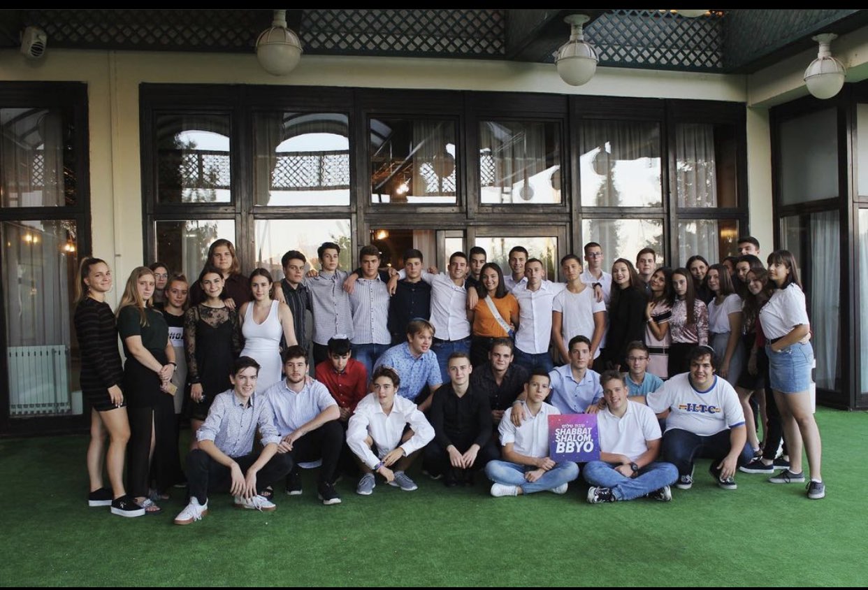 Group of people celebrating on stage