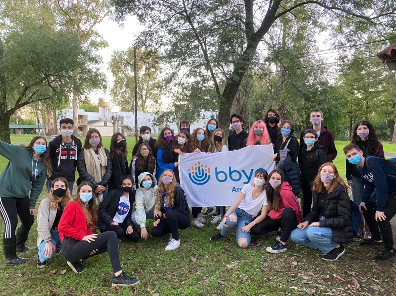 Group of people celebrating on stage