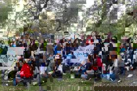 Group of people celebrating on stage