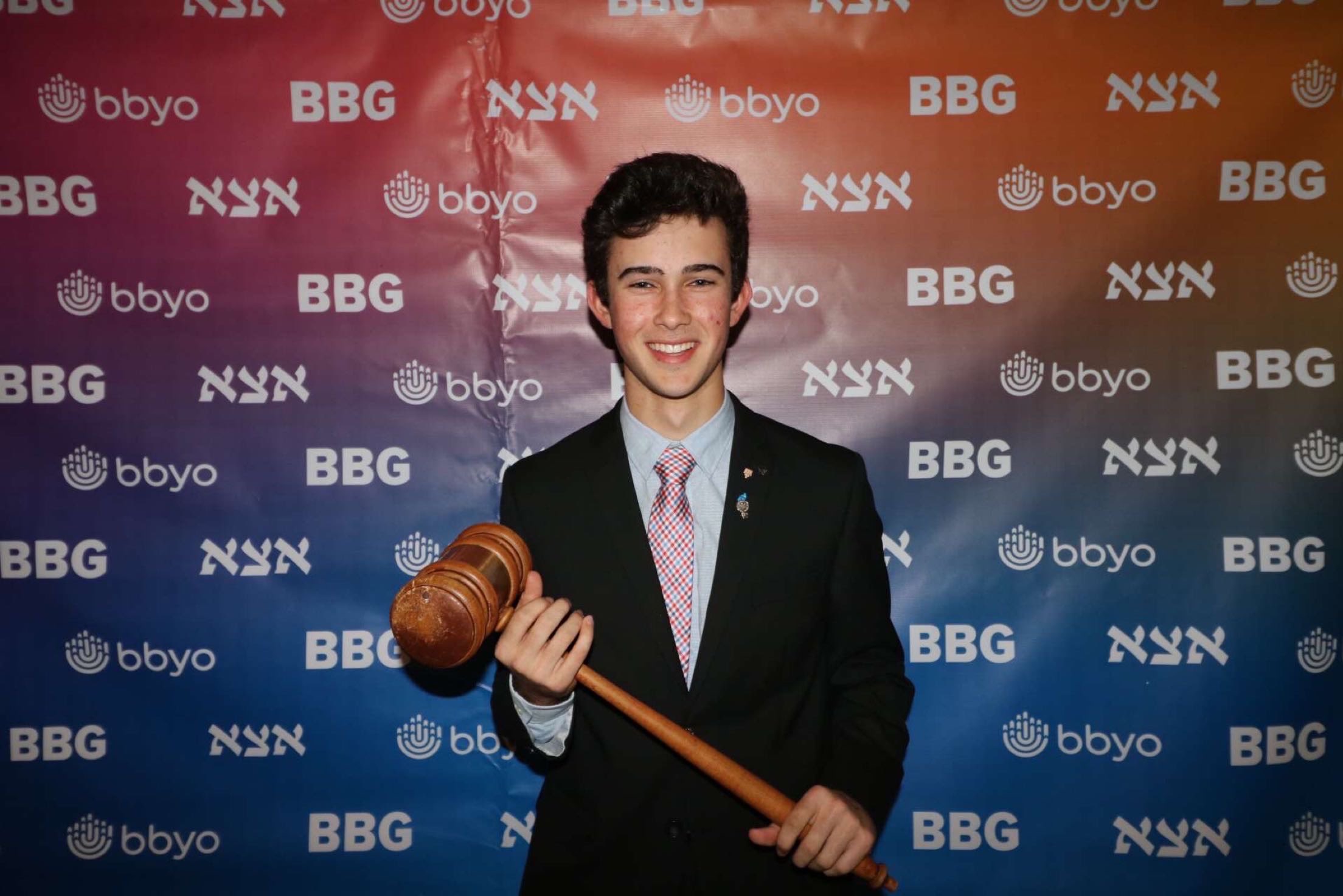 Group of people celebrating on stage