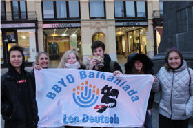 Group of people celebrating on stage