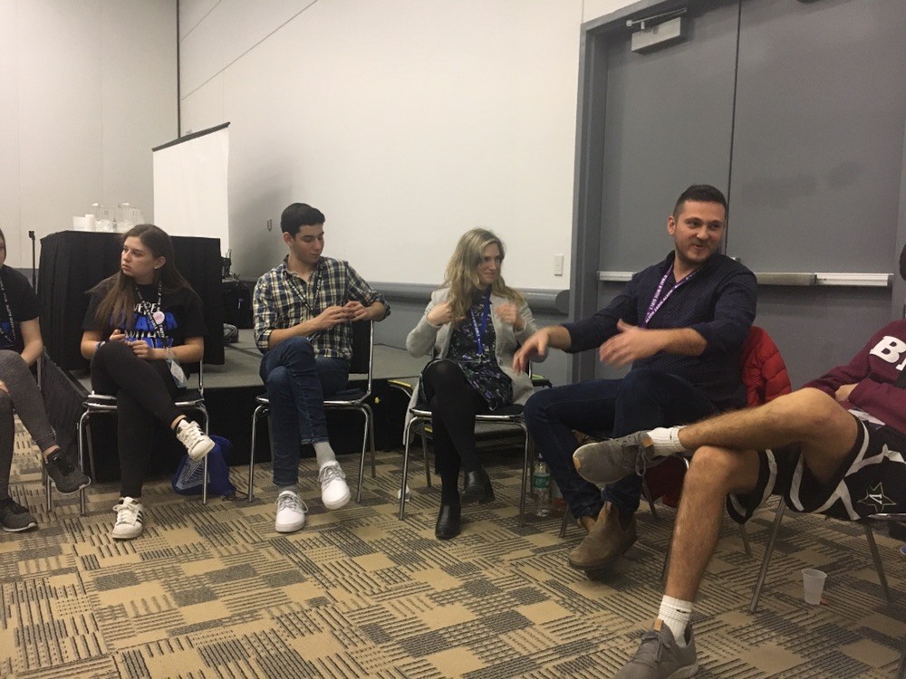 Group of people celebrating on stage