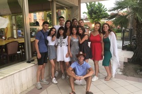 Group of people celebrating on stage