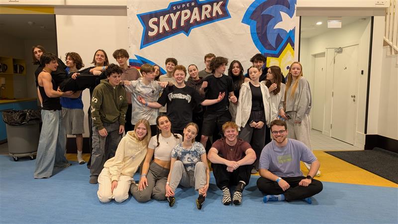 Group of people celebrating on stage