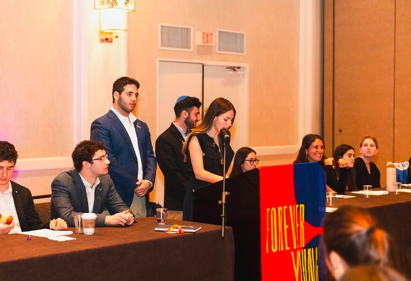 Group of people celebrating on stage