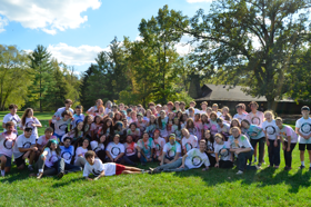 Group of people celebrating on stage