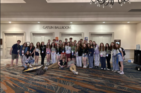 Group of people celebrating on stage