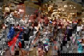 Group of people celebrating on stage