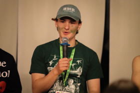 Group of people celebrating on stage