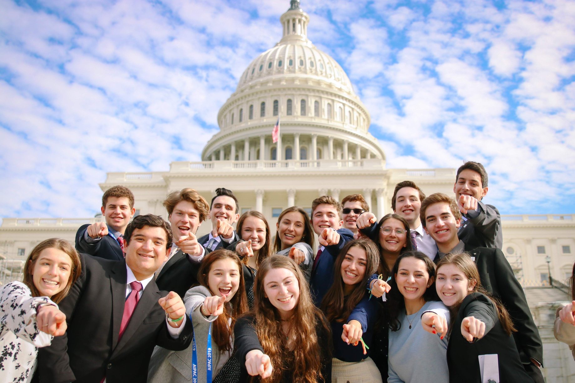 Group of people celebrating on stage
