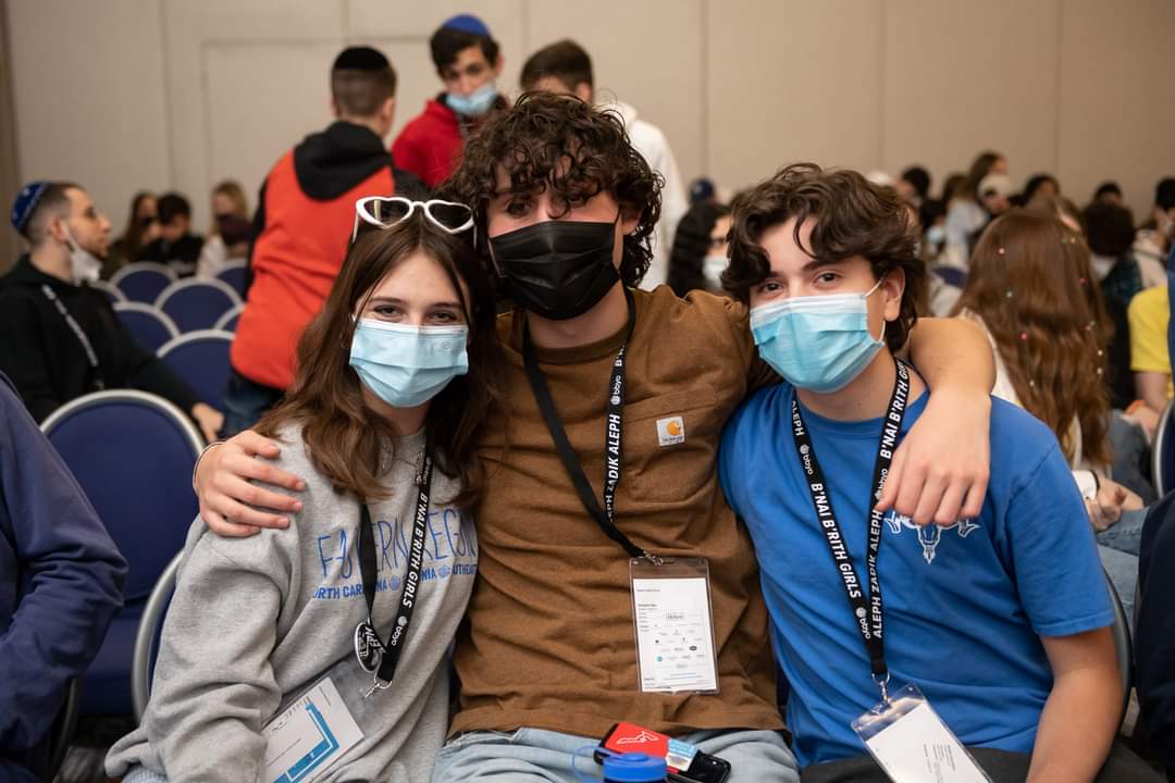 Group of people celebrating on stage