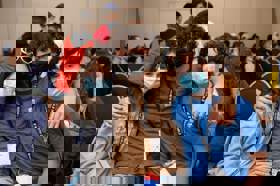 Group of people celebrating on stage